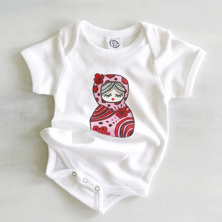 pink and red russian nesting doll retro toy print on organic cotton baby girl onesie toddler shirt
